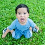 Little,asian,boy,crying,bitterly